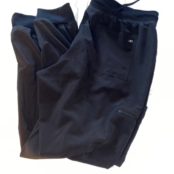 Black scrubs, size xl. Not sure what brand size but brand logo is “ aa “ - Picture 1 of 1